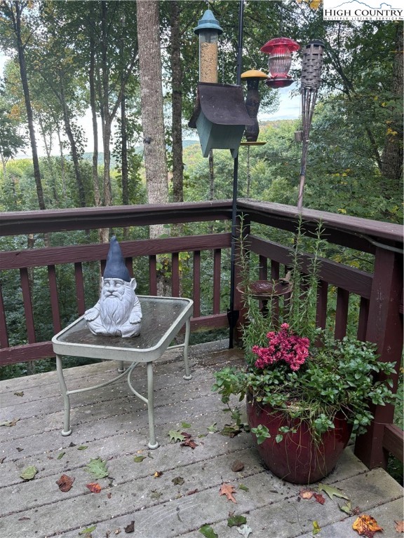 304 St Andrews Road Beech Mountain, NC 28604 - Photo 5 of 33 a view of a bench in the patio