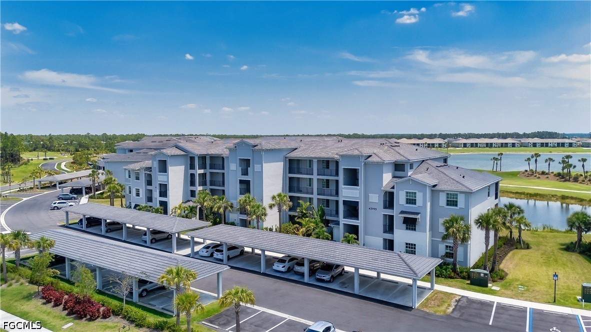 43993 Boardwalk Loop, Unit 1941 Punta Gorda, FL 33982 - Photo 22 of 36 a view of a city with tall buildings