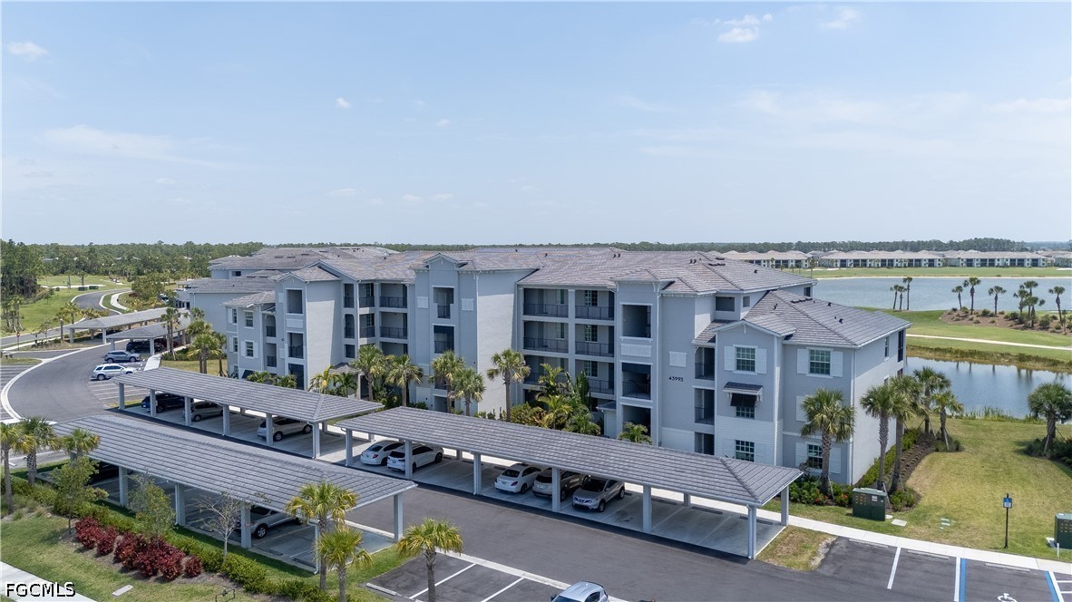 43993 Boardwalk Loop, Unit 1941 Punta Gorda, FL 33982 - Photo 24 of 36 a view of a city with tall buildings