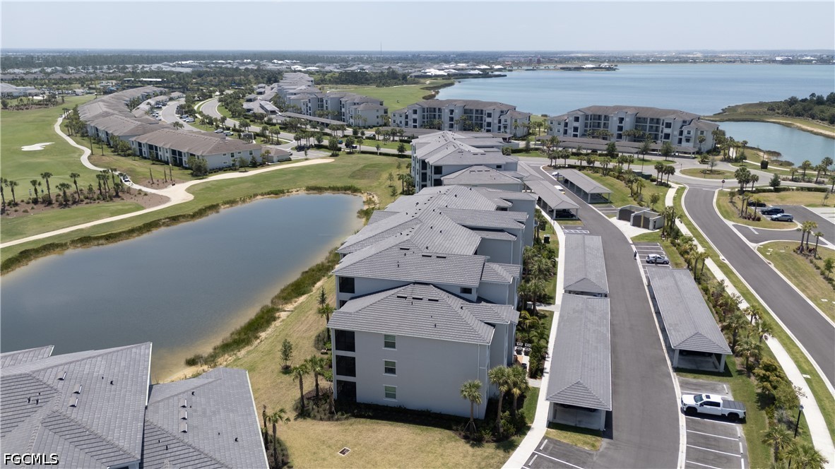 43993 Boardwalk Loop, Unit 1941 Punta Gorda, FL 33982 - Photo 27 of 36 an aerial view of a house with a lake view