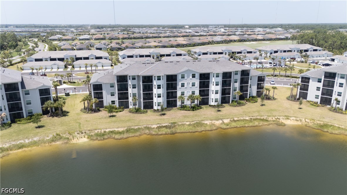 43993 Boardwalk Loop, Unit 1941 Punta Gorda, FL 33982 - Photo 30 of 36 a view of a big building next to a big building