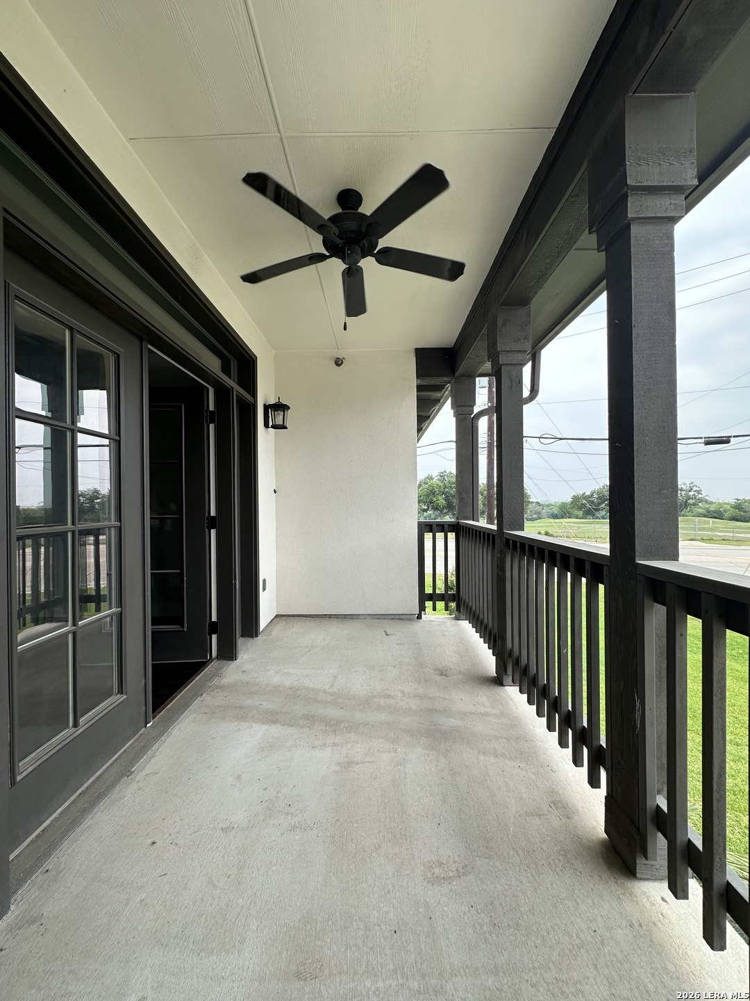 831 Terrell Road, Unit 103 San Antonio, TX 78209 - Photo 8 of 8 a view of a hallway with a large window