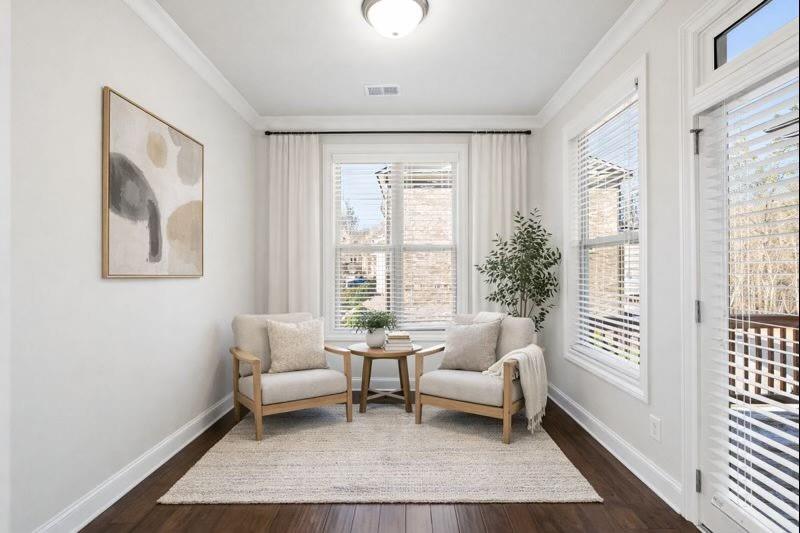 1002 Township Square Alpharetta, GA 30022 - Photo 18 of 42 a living room with furniture and a window