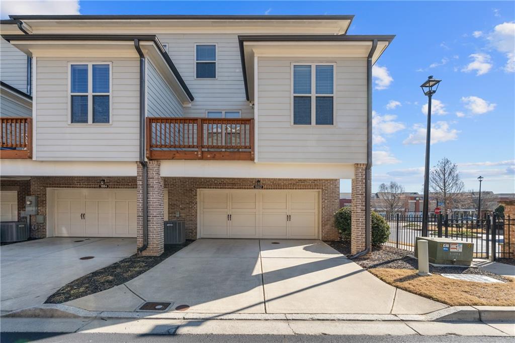 1002 Township Square Alpharetta, GA 30022 - Photo 42 of 42 a view of a house with a terrace