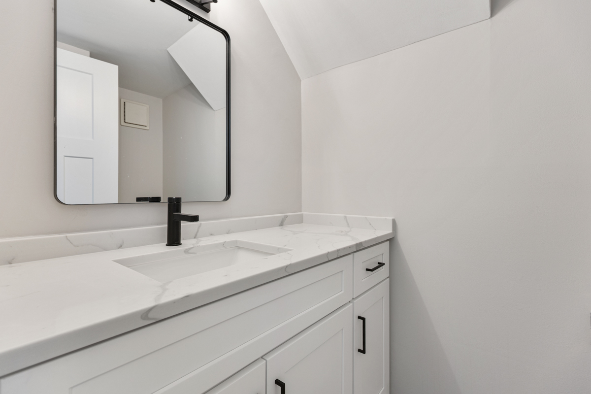 1066 Glouchester Harbor, Unit 1066 Schaumburg, IL 60193 - Photo 12 of 26 a bathroom with a sink and a mirror