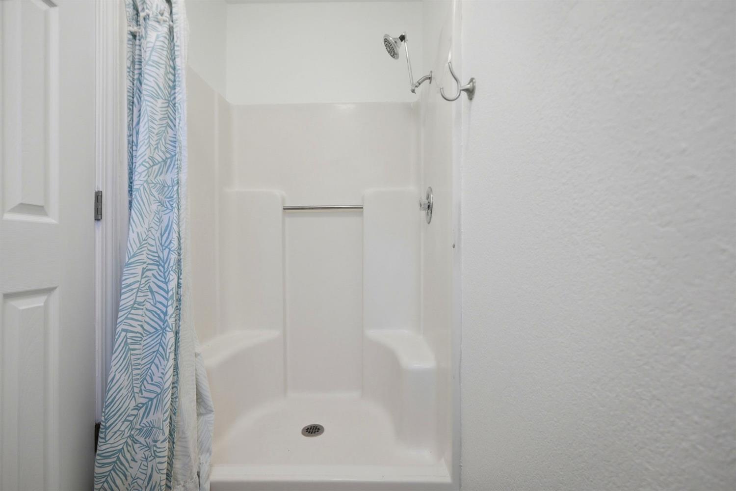 5932 Angelo Drive Loomis, CA 95650 - Photo 20 of 32 a bathroom with a shower