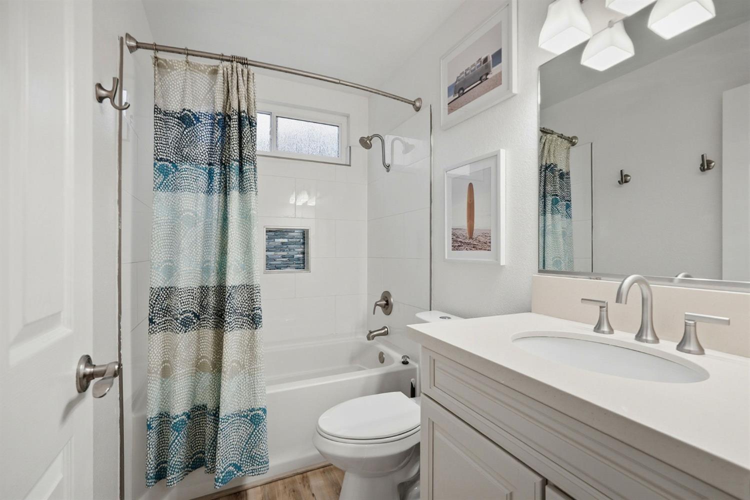 5932 Angelo Drive Loomis, CA 95650 - Photo 27 of 32 a bathroom with a sink toilet tub and shower
