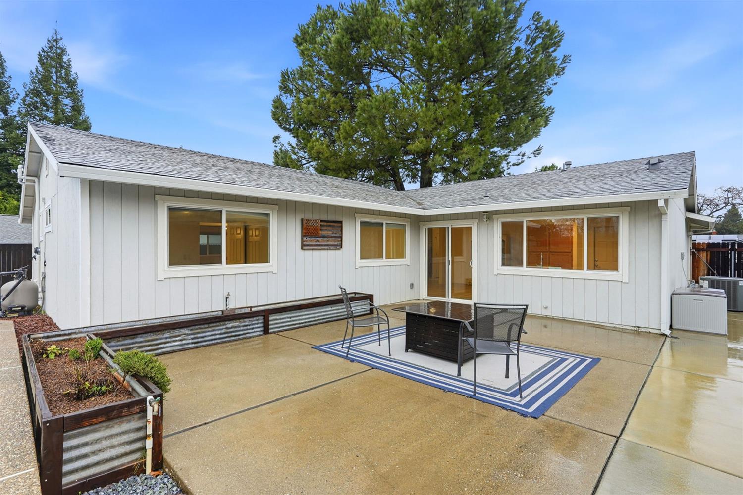 5932 Angelo Drive Loomis, CA 95650 - Photo 29 of 32 a front view of house with yard outdoor seating and barbeque oven