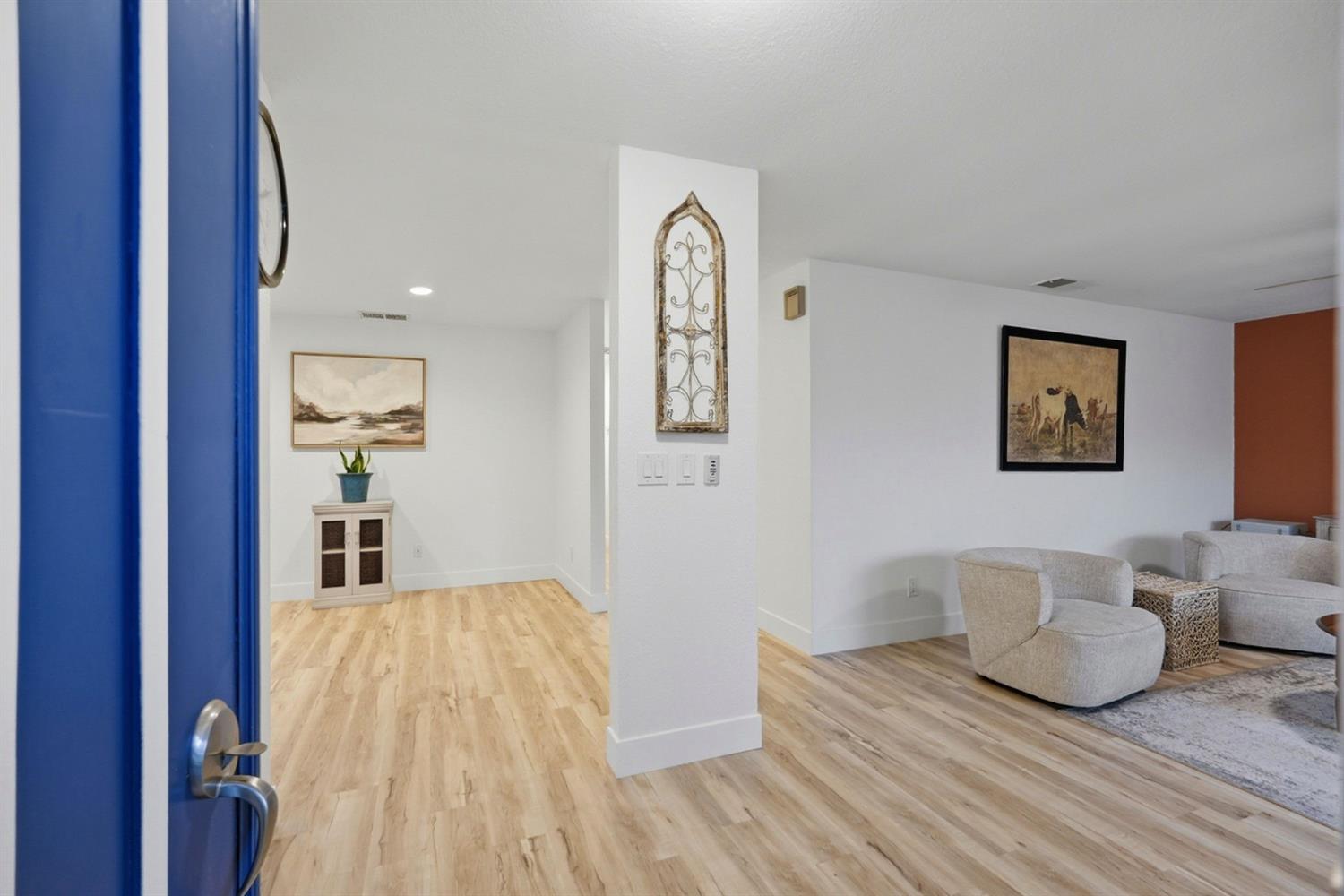 5932 Angelo Drive Loomis, CA 95650 - Photo 8 of 32 a bedroom with a bed and painting on the wall