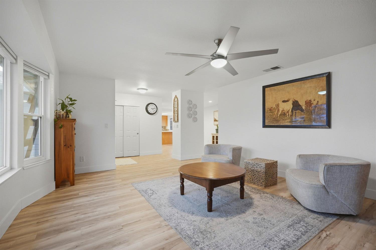 5932 Angelo Drive Loomis, CA 95650 - Photo 10 of 32 a living room with furniture and a wooden floor