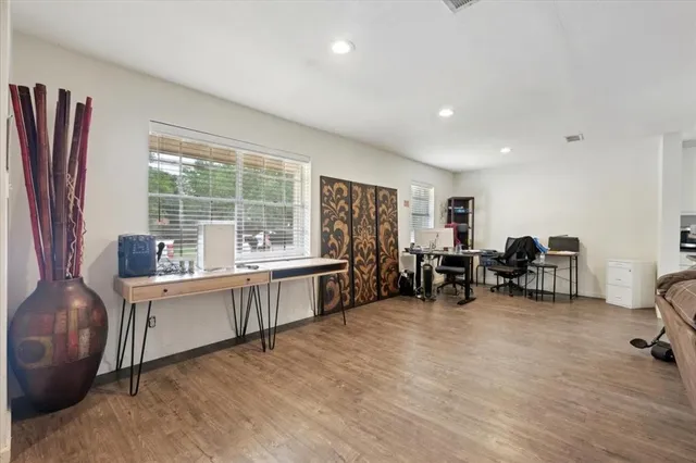 a kitchen with sink cabinets and dining table