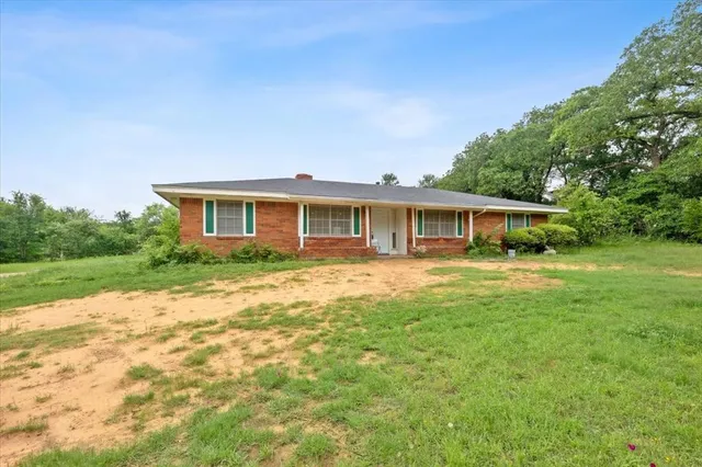 a house view with a garden space