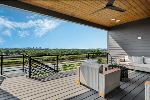 a view of a roof deck with couches