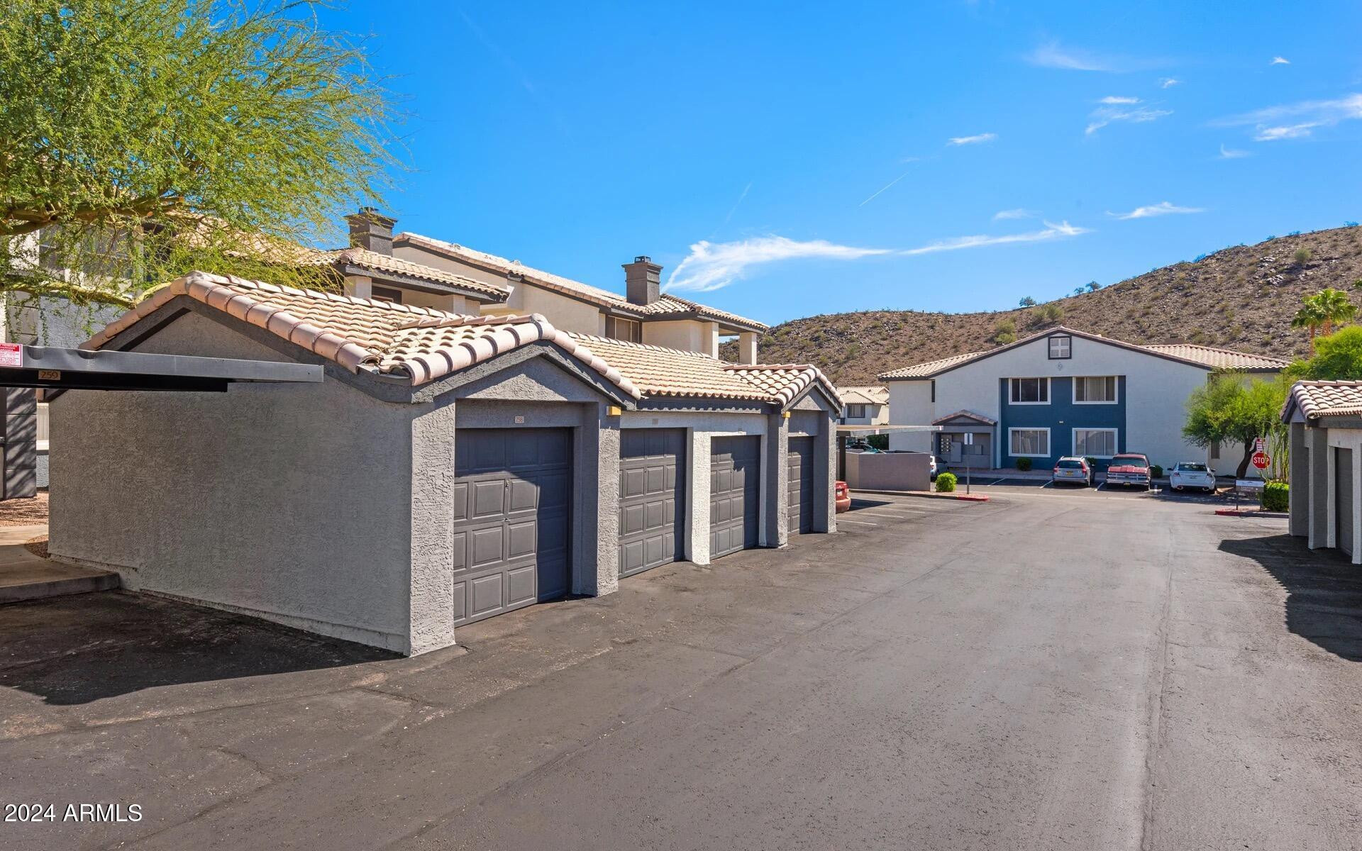 3625 East Ray Road, Unit 1 Phoenix, AZ 85044 - Photo 17 of 29 a view of a house with a street