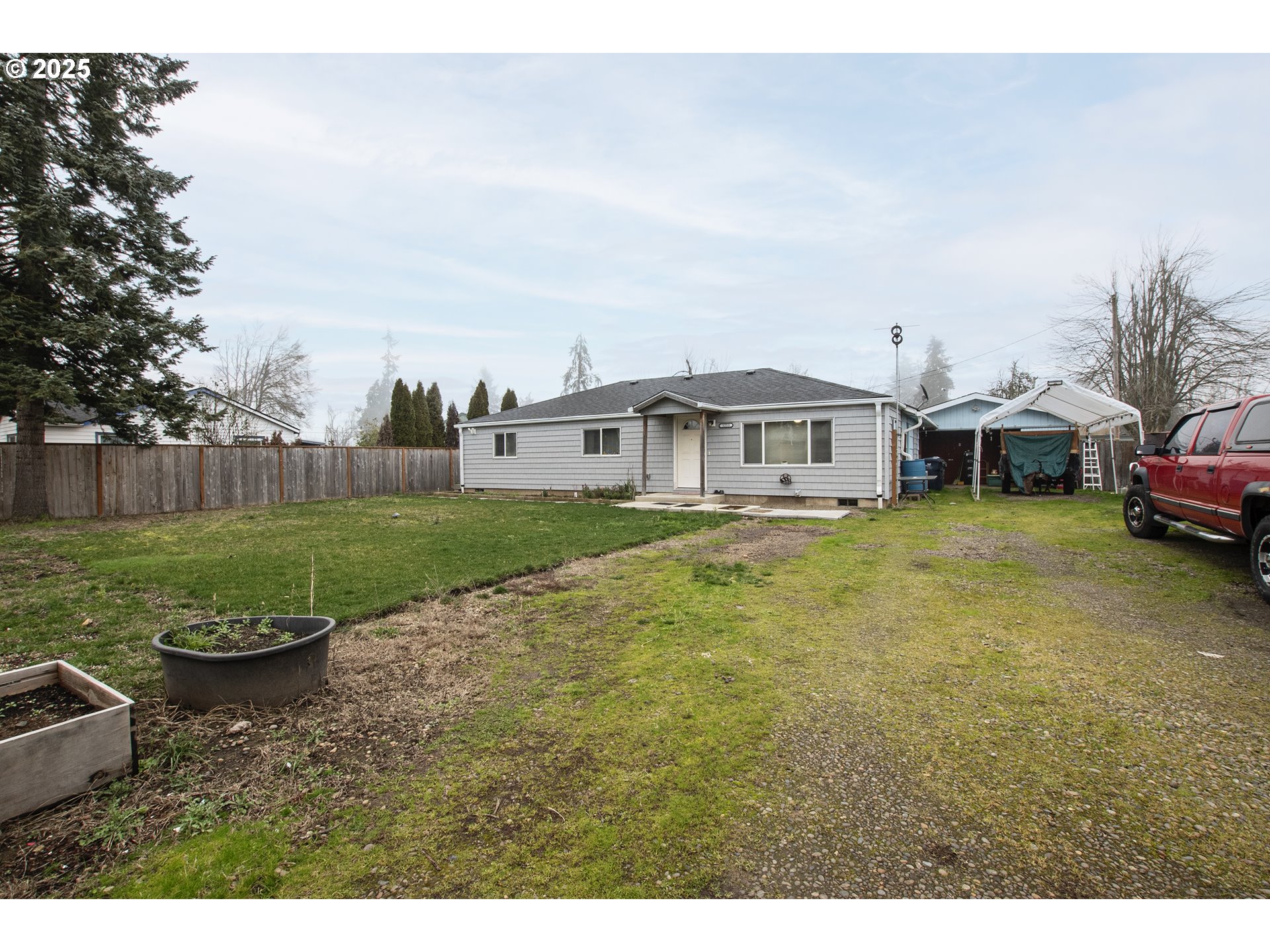 1253 30th Street Springfield, OR 97478 - Photo 1 of 15 a view of a house with swimming pool and a yard