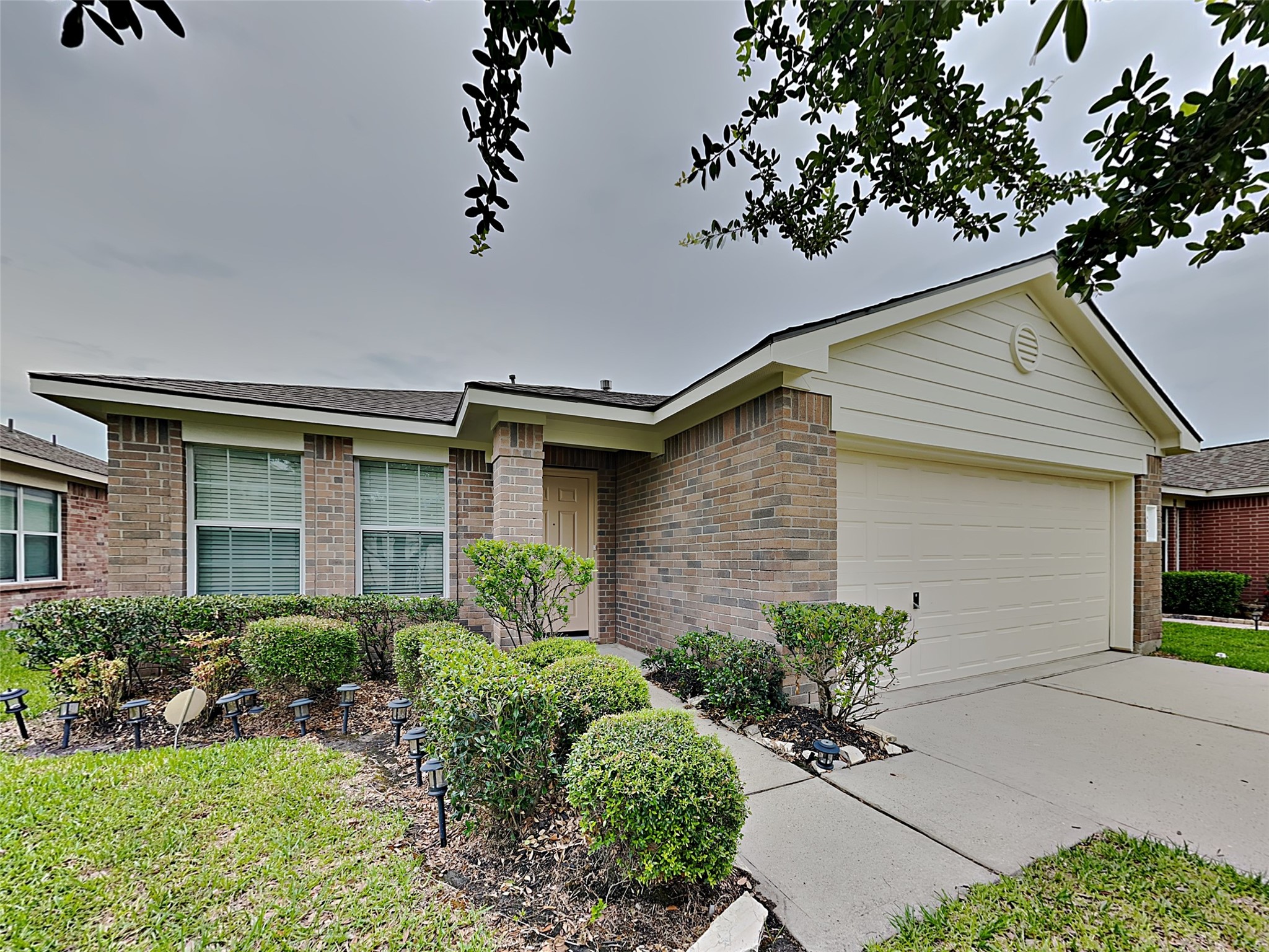 8119 Katie Mill Trail Spring, TX 77379 - Photo 1 of 18 a front view of a house with garden