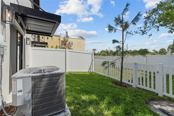a view of a backyard of the house