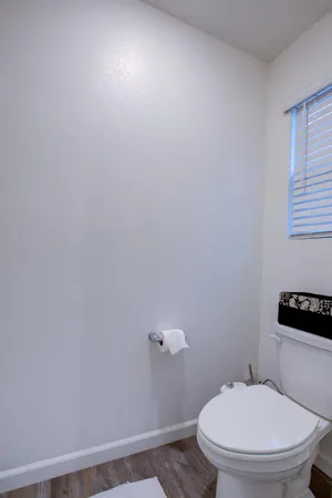 a view of a chairs and tables in patio