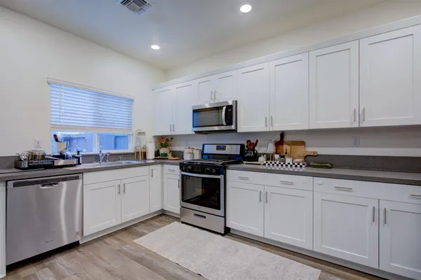 a bathroom with a sink and mirror