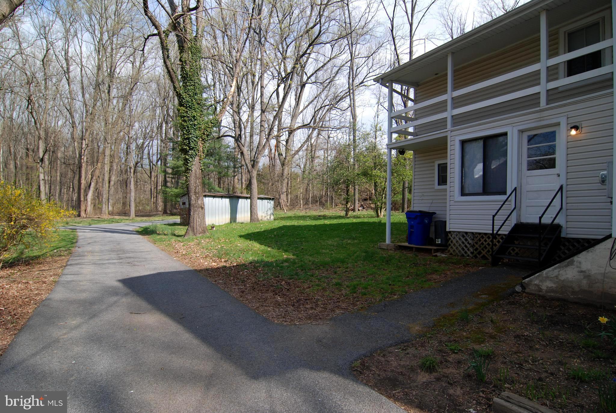 6722 South Clifton Road Frederick, MD 21703 - Photo 2 of 30 a view of a house with a yard