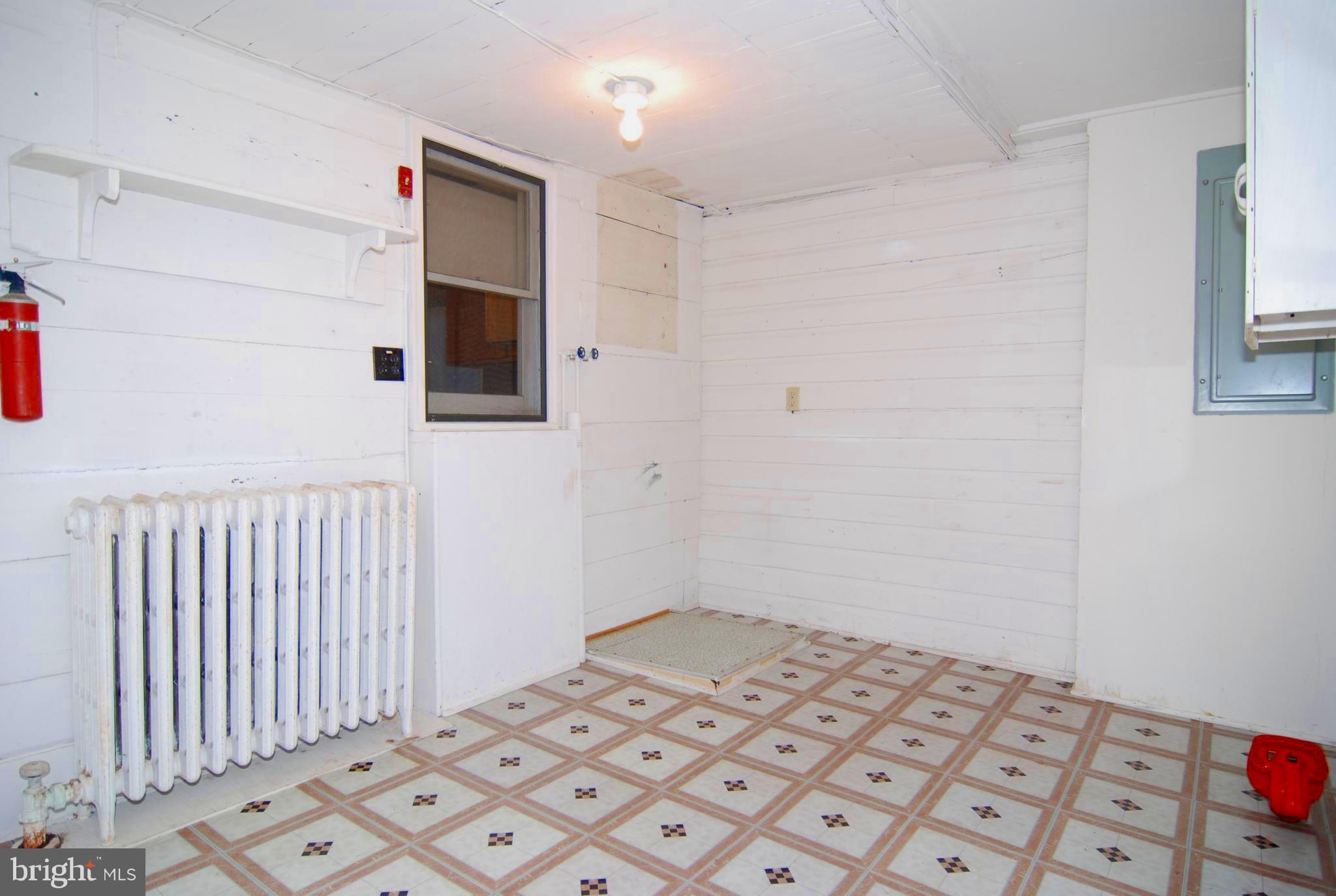 6722 South Clifton Road Frederick, MD 21703 - Photo 13 of 30 a bedroom with a bed and a window