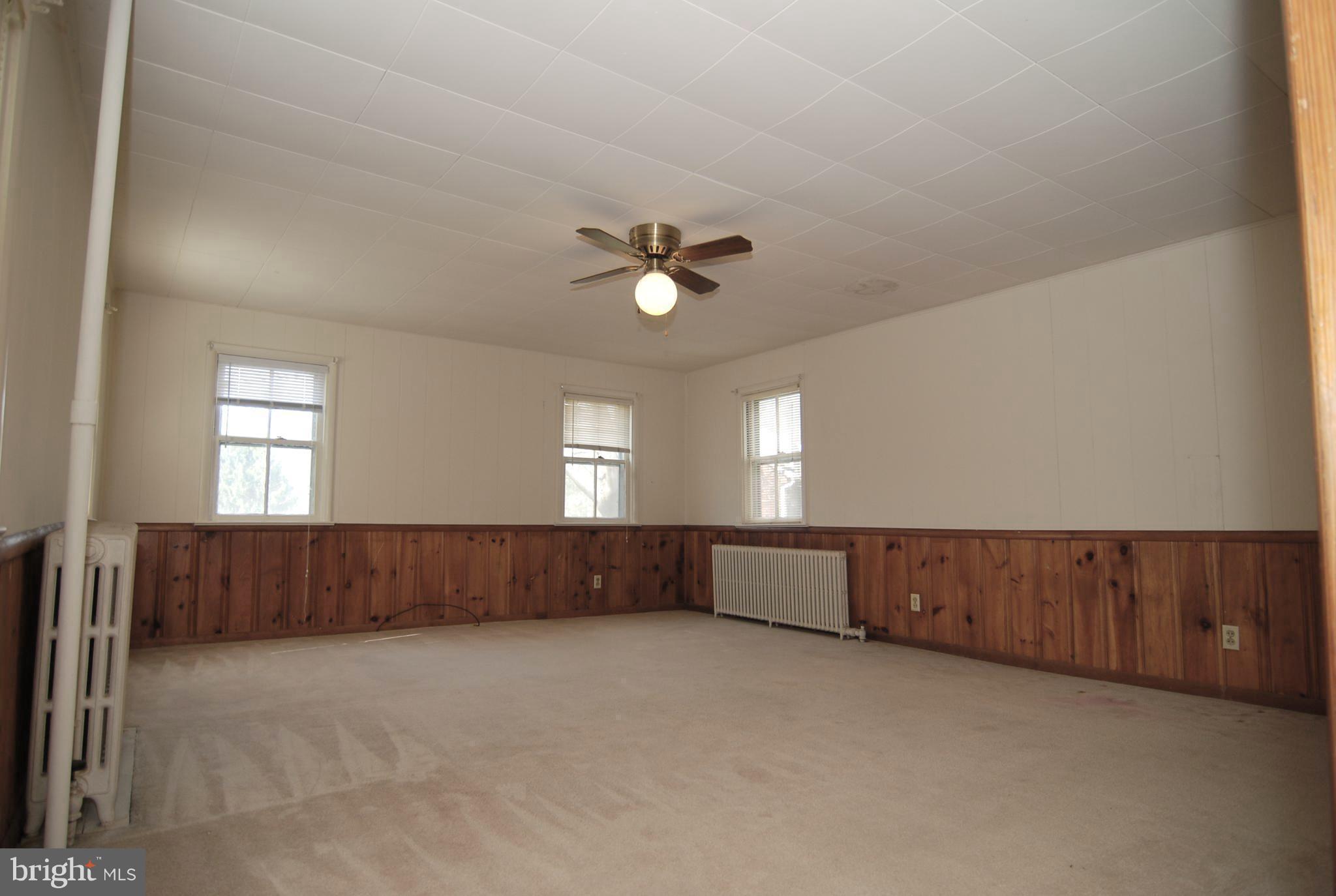 6722 South Clifton Road Frederick, MD 21703 - Photo 6 of 30 an empty room with windows