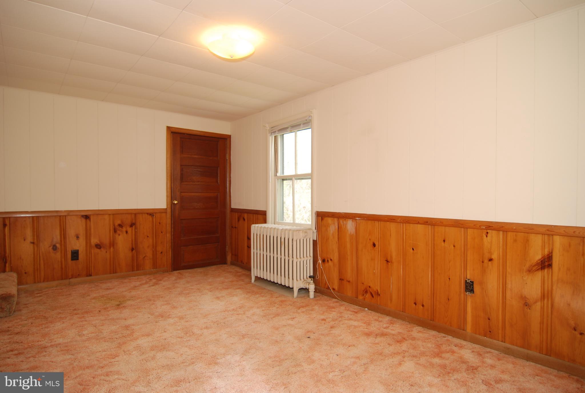 6722 South Clifton Road Frederick, MD 21703 - Photo 9 of 30 an empty room with windows