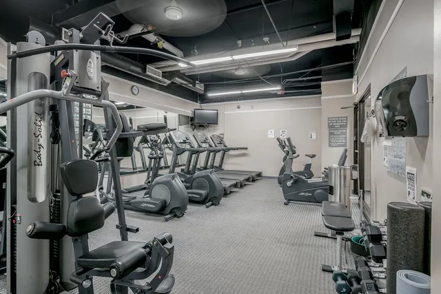 a view of a room with gym equipment