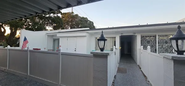a view of a house with a porch