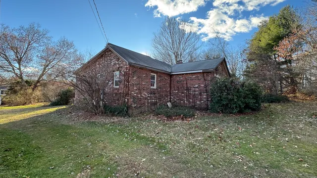 a big room with lots of trees and plants