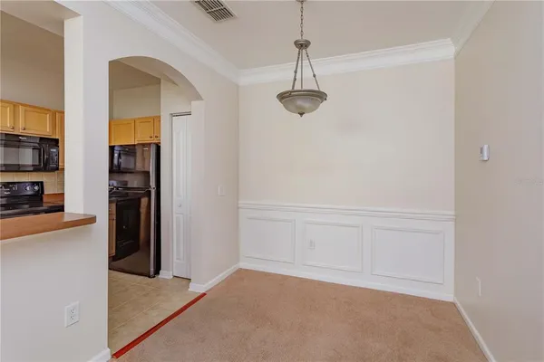 a view of a hallway with closet