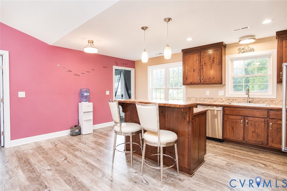2255 Mahixon Road Manquin, VA 23106 - Photo 9 of 10 Kitchen featuring wood-finish flooring, recessed l