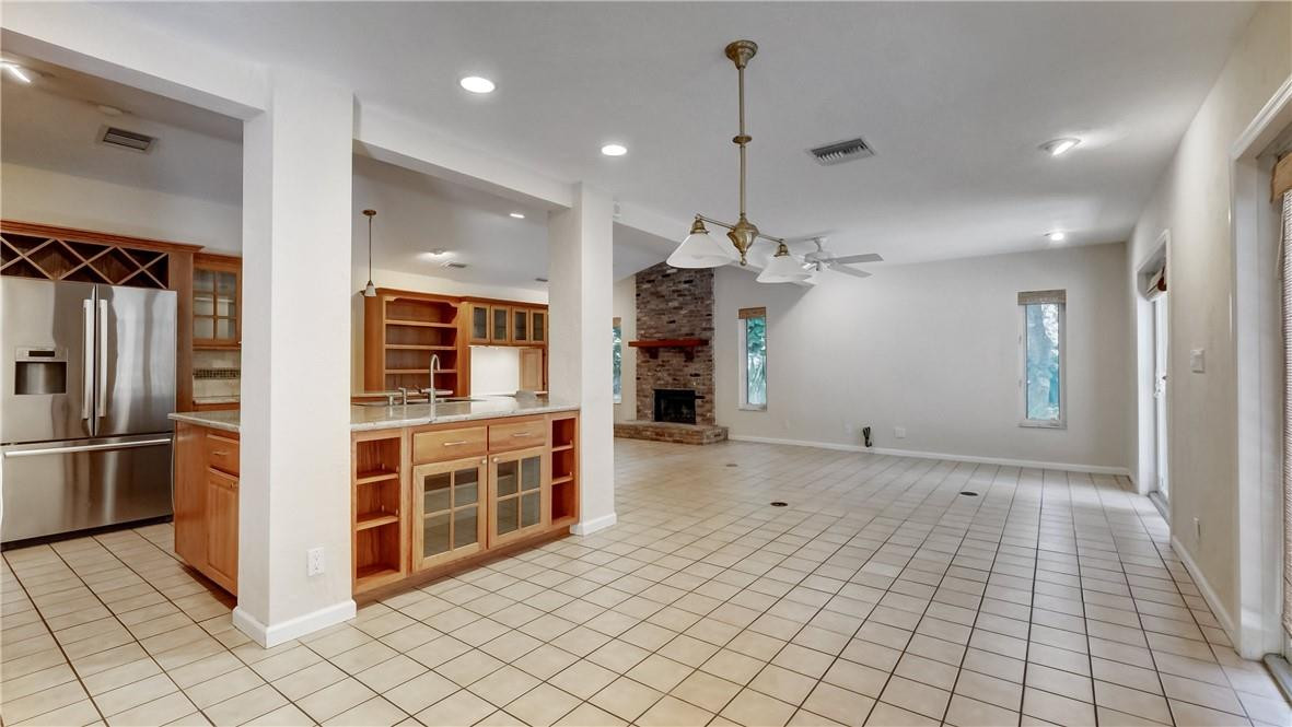 10890 Southwest 83rd Avenue Miami, FL 33156 - Photo 25 of 46 a view of a kitchen with a refrigerator and a sink