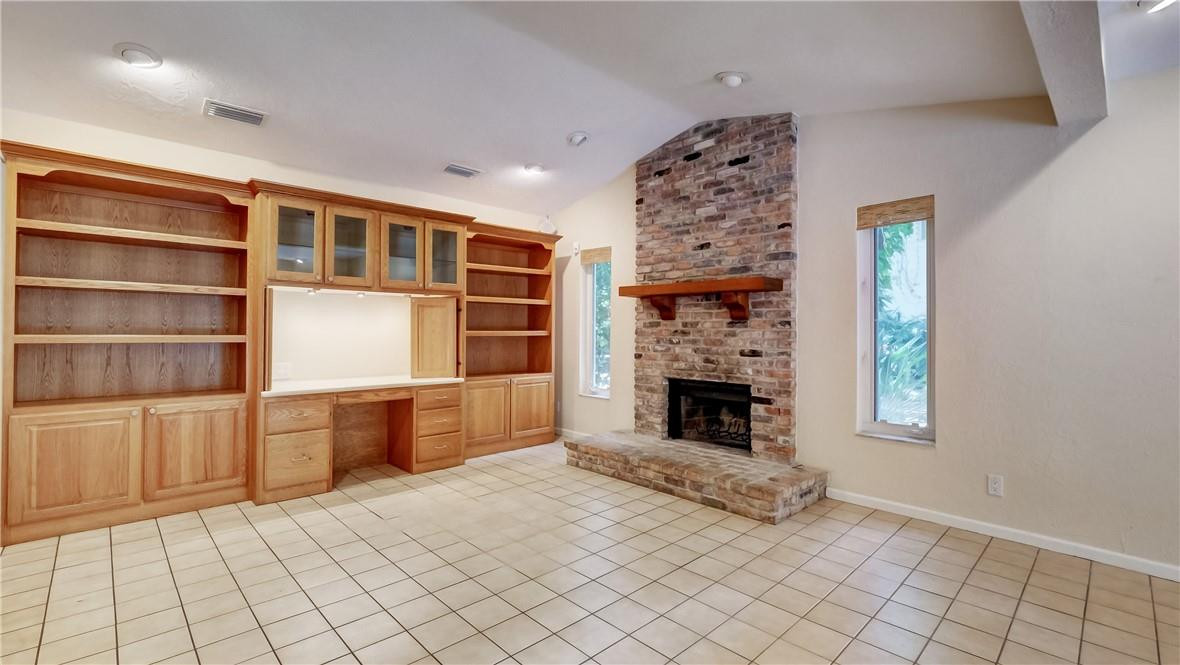 10890 Southwest 83rd Avenue Miami, FL 33156 - Photo 28 of 46 a view of an empty room with cabinet and fireplace