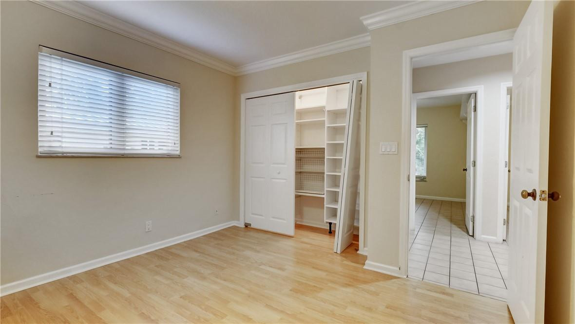 10890 Southwest 83rd Avenue Miami, FL 33156 - Photo 35 of 46 an empty room with closet and a window