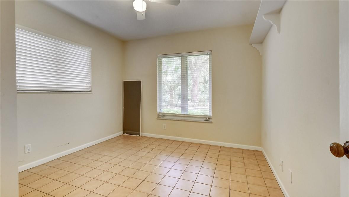 10890 Southwest 83rd Avenue Miami, FL 33156 - Photo 36 of 46 a view of an empty room with window