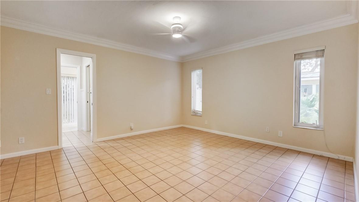 10890 Southwest 83rd Avenue Miami, FL 33156 - Photo 39 of 46 an empty room with windows and closet