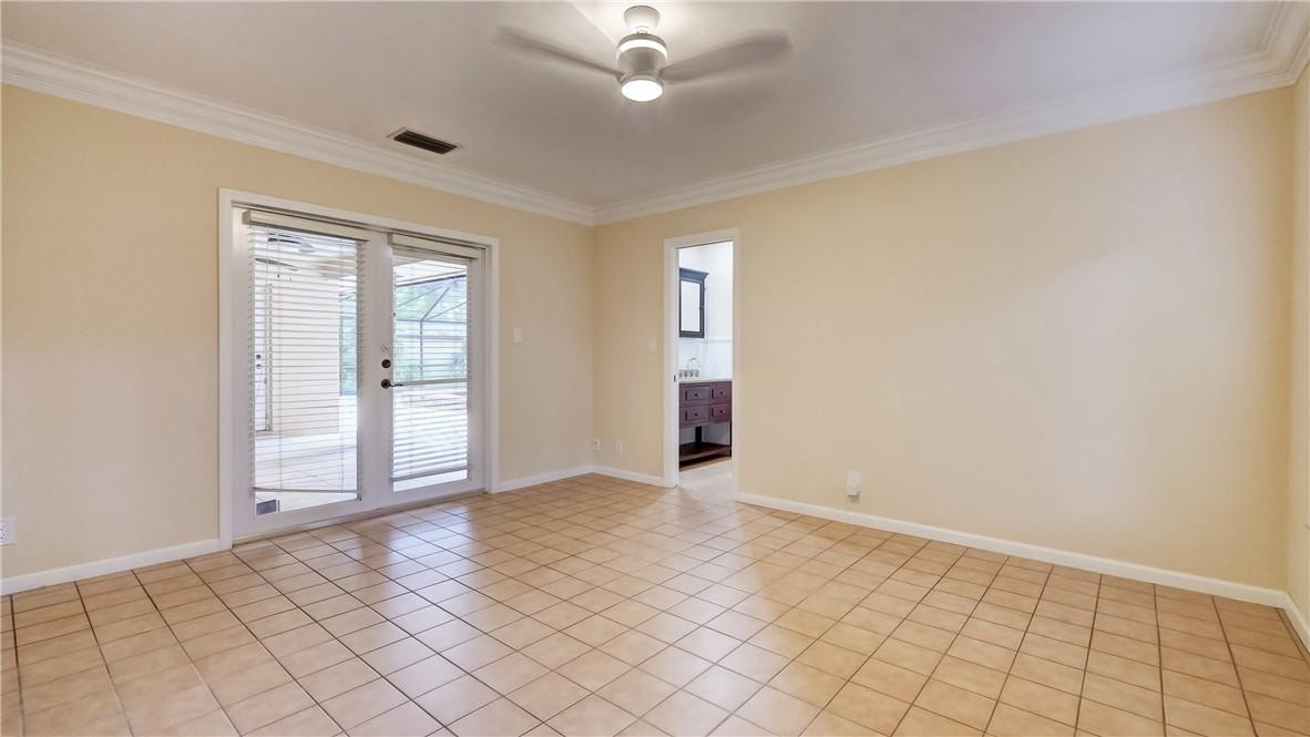10890 Southwest 83rd Avenue Miami, FL 33156 - Photo 40 of 46 wooden floor in an empty room with a window