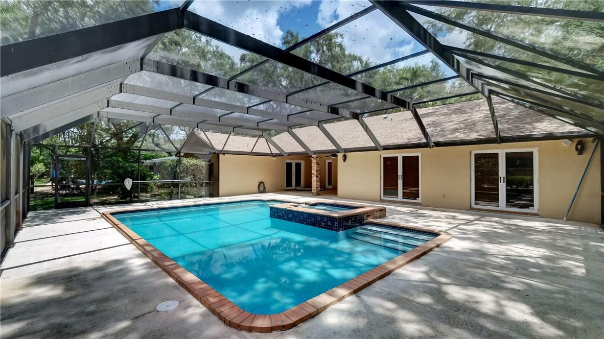 10890 Southwest 83rd Avenue Miami, FL 33156 - Photo 9 of 46 a view of swimming pool with a patio