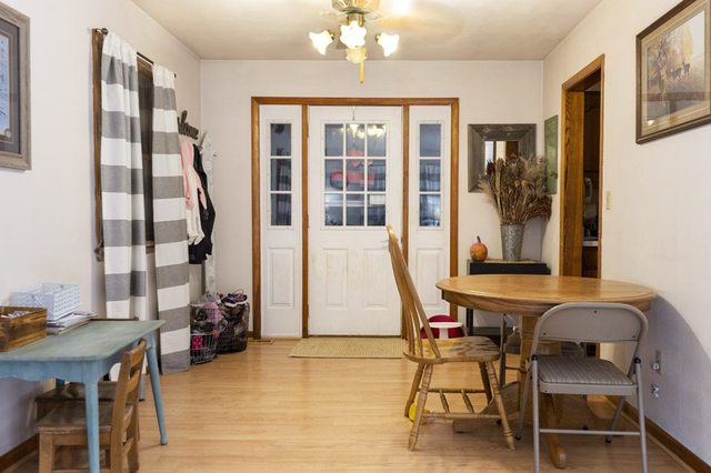 6353 South Ridge Road Oregon, IL 61061 - Photo 40 of 40 a view of a dining room with furniture and window