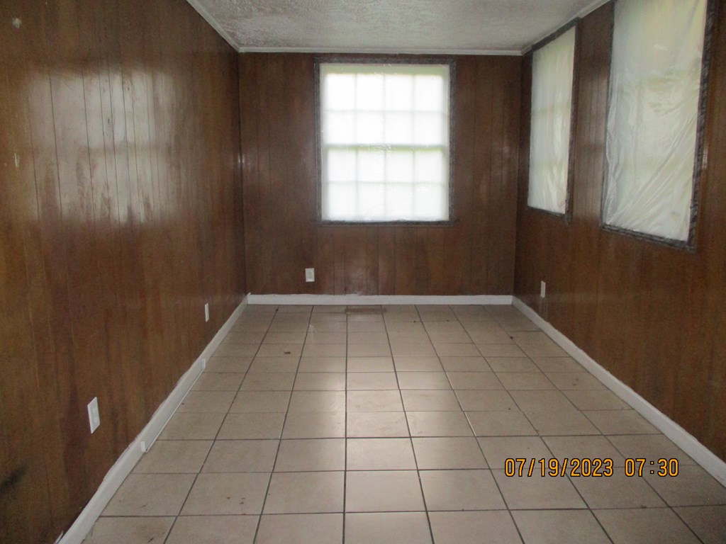 1036 Calvin Avenue Columbus, GA 31903 - Photo 17 of 23 a view of a room with white walls and a window