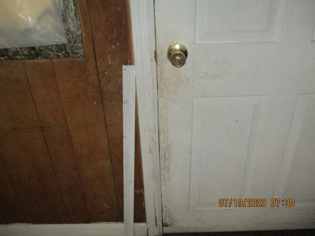 a close view of a door and chair