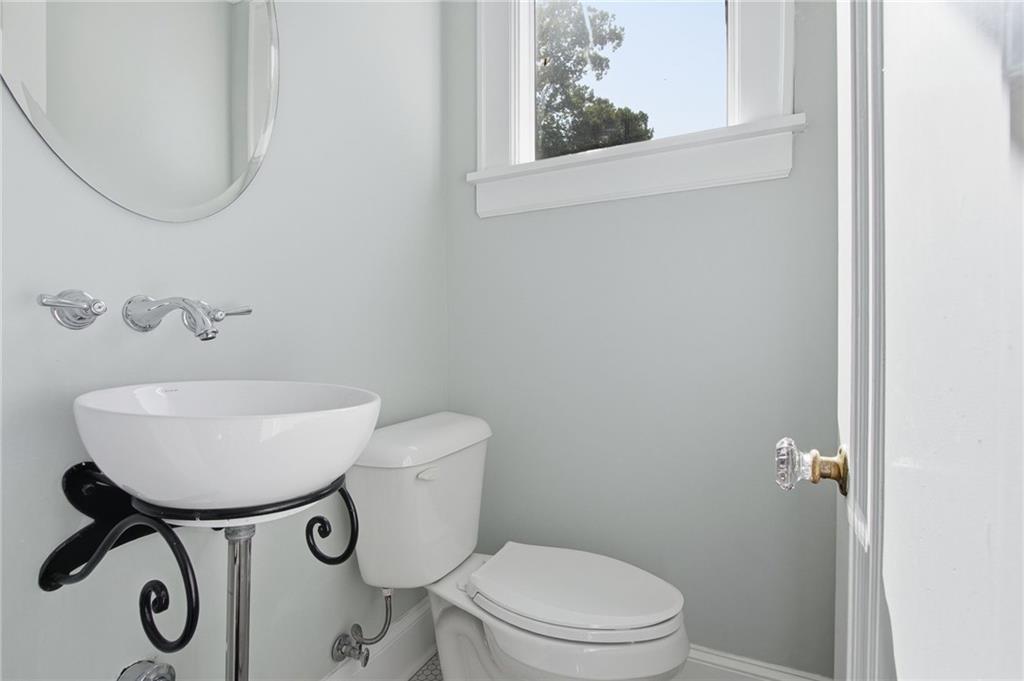 1417 Briarcliff Road Northeast Atlanta, GA 30306 - Photo 19 of 51 a bathroom with a toilet and a sink