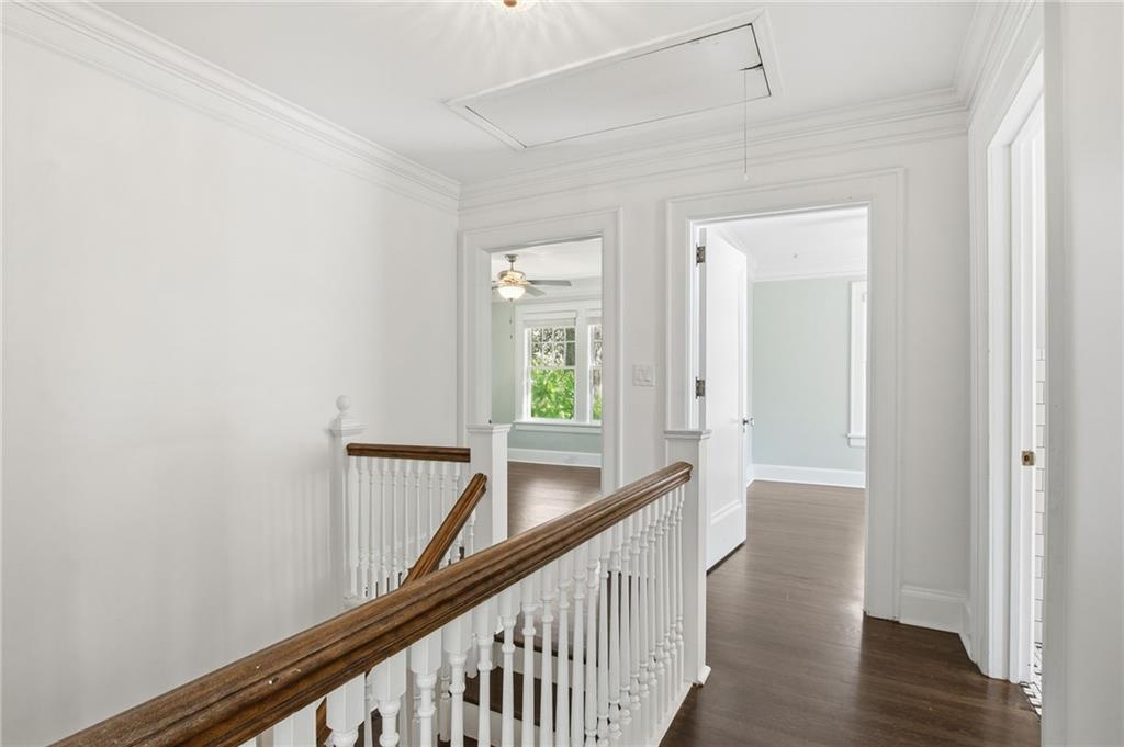 1417 Briarcliff Road Northeast Atlanta, GA 30306 - Photo 27 of 51 a view of a hallway with wooden floor and staircase