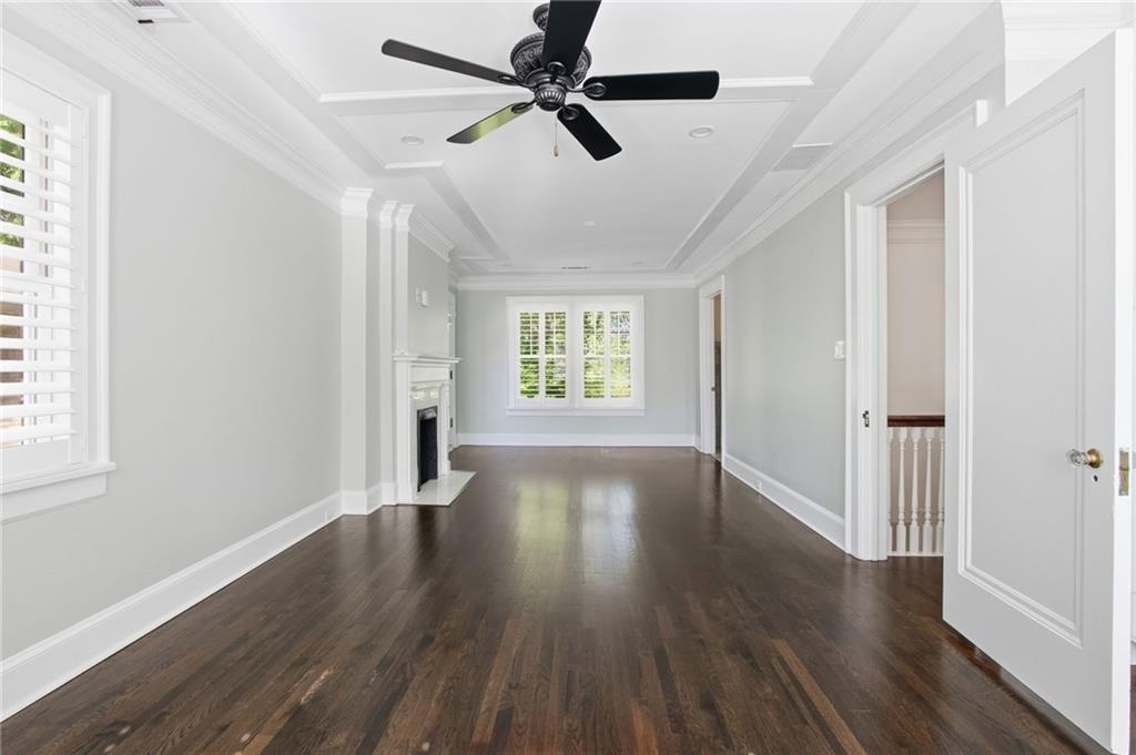 1417 Briarcliff Road Northeast Atlanta, GA 30306 - Photo 30 of 51 a view of an empty room with window and wooden floor
