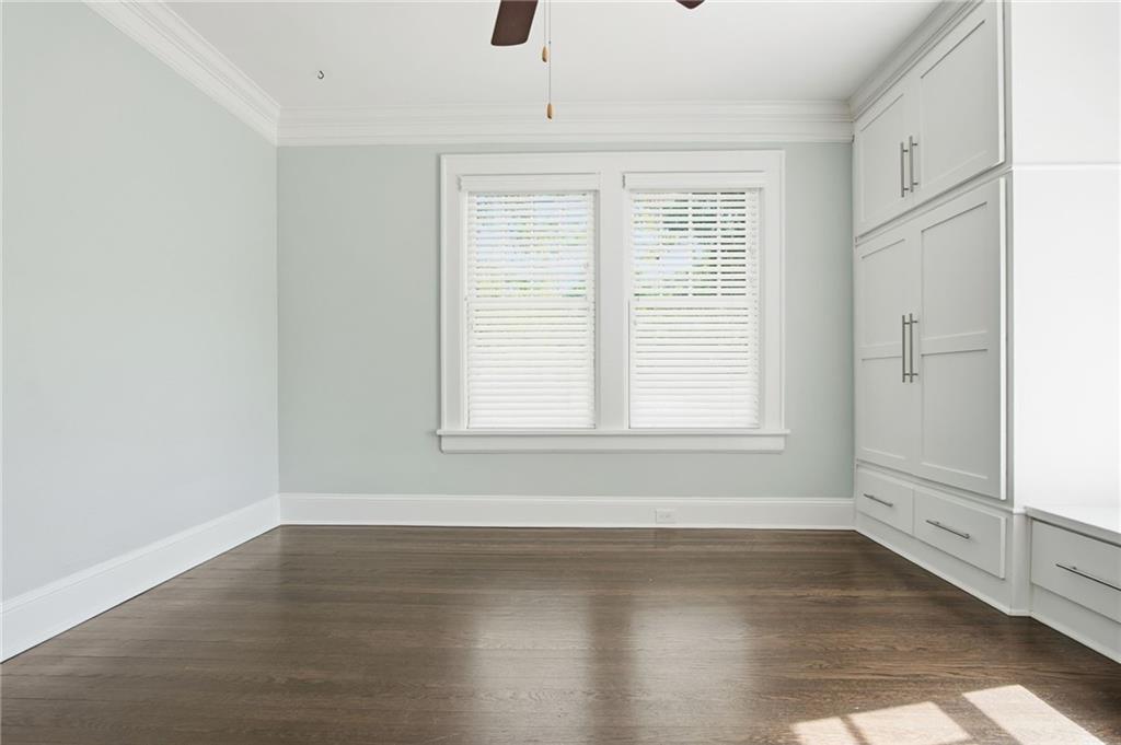 1417 Briarcliff Road Northeast Atlanta, GA 30306 - Photo 36 of 51 an empty room with wooden floor and windows
