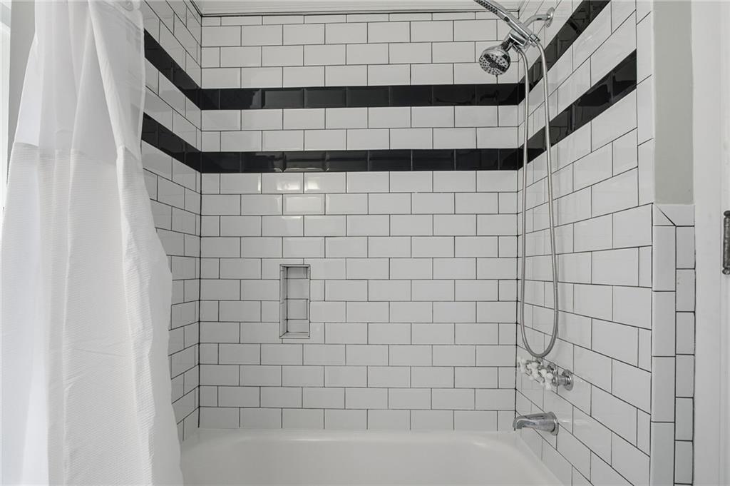 1417 Briarcliff Road Northeast Atlanta, GA 30306 - Photo 38 of 51 a bathroom with a shower