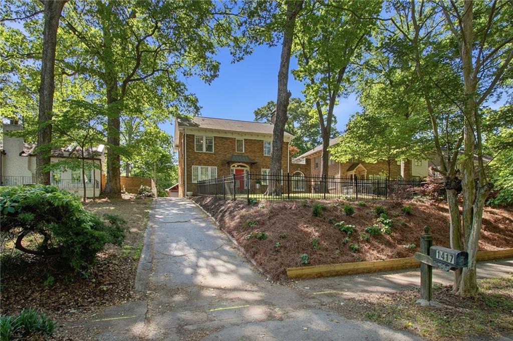 1417 Briarcliff Road Northeast Atlanta, GA 30306 - Photo 51 of 51 a view of a house with a tree in the background