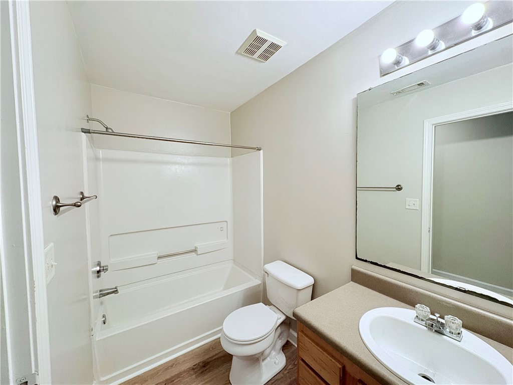 501 Harts Cove Way Seneca, SC 29678 - Photo 15 of 24 combination with a vanity and mirror.