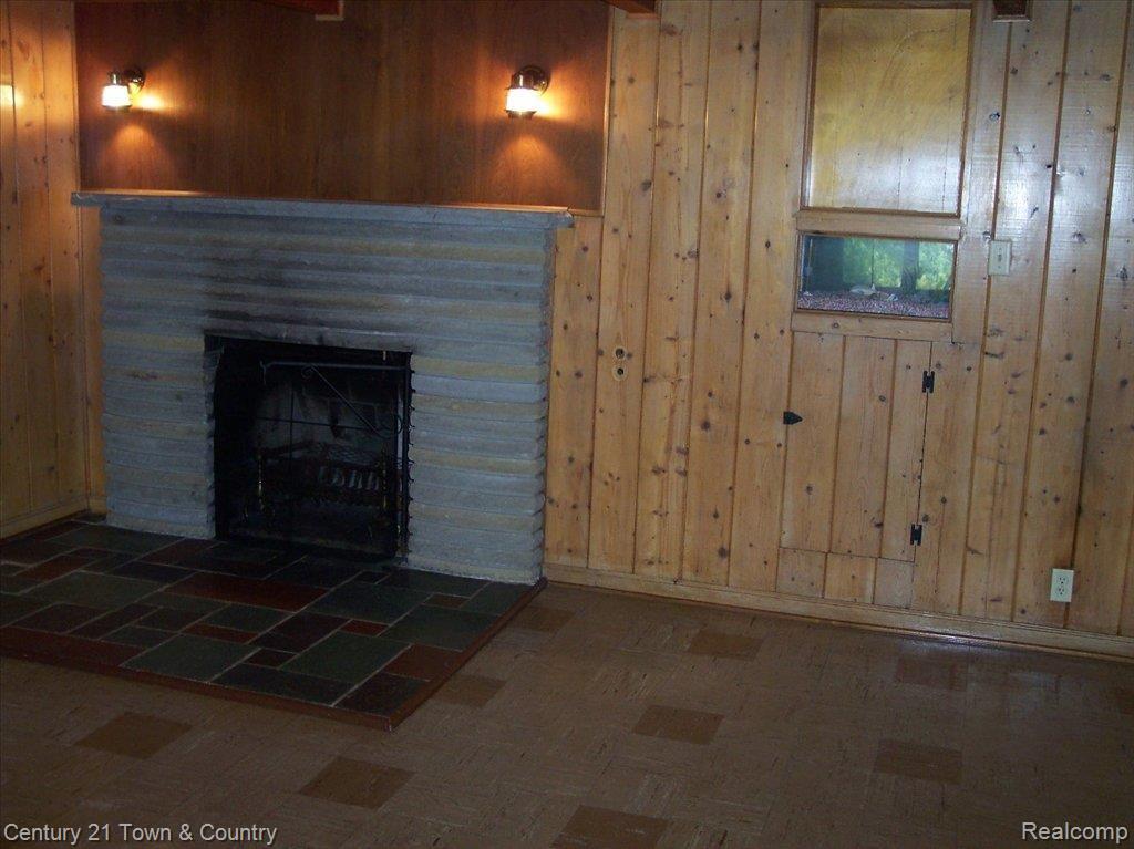 6051 Middle Lake Road Clarkston, MI 48346 - Photo 11 of 24 Finished Walk-out Bsmt w Firepla